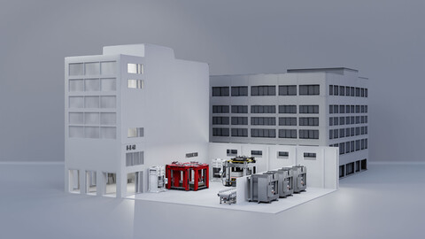 Modell eines Fabrikgebäudes mit Produktionsbereich und mehreren Maschinen als Symbol für moderne Fertigung.