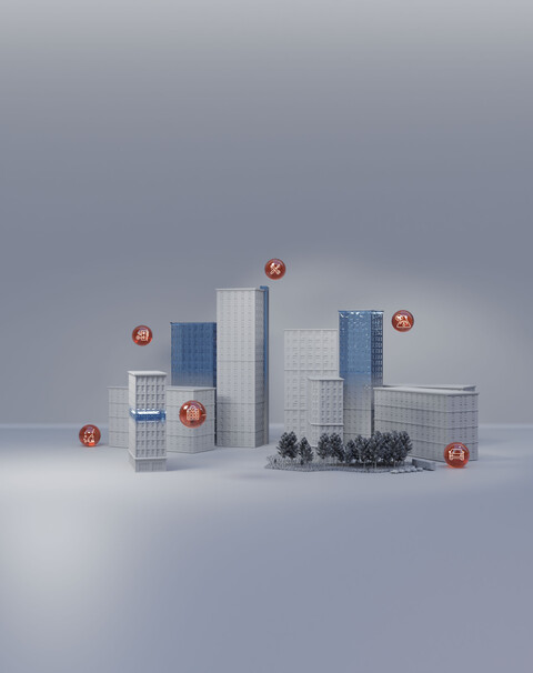 Modell einer Stadt mit Hochhäusern und Funktions-Icons als Symbol für digitale Services im Gebäudebetrieb.