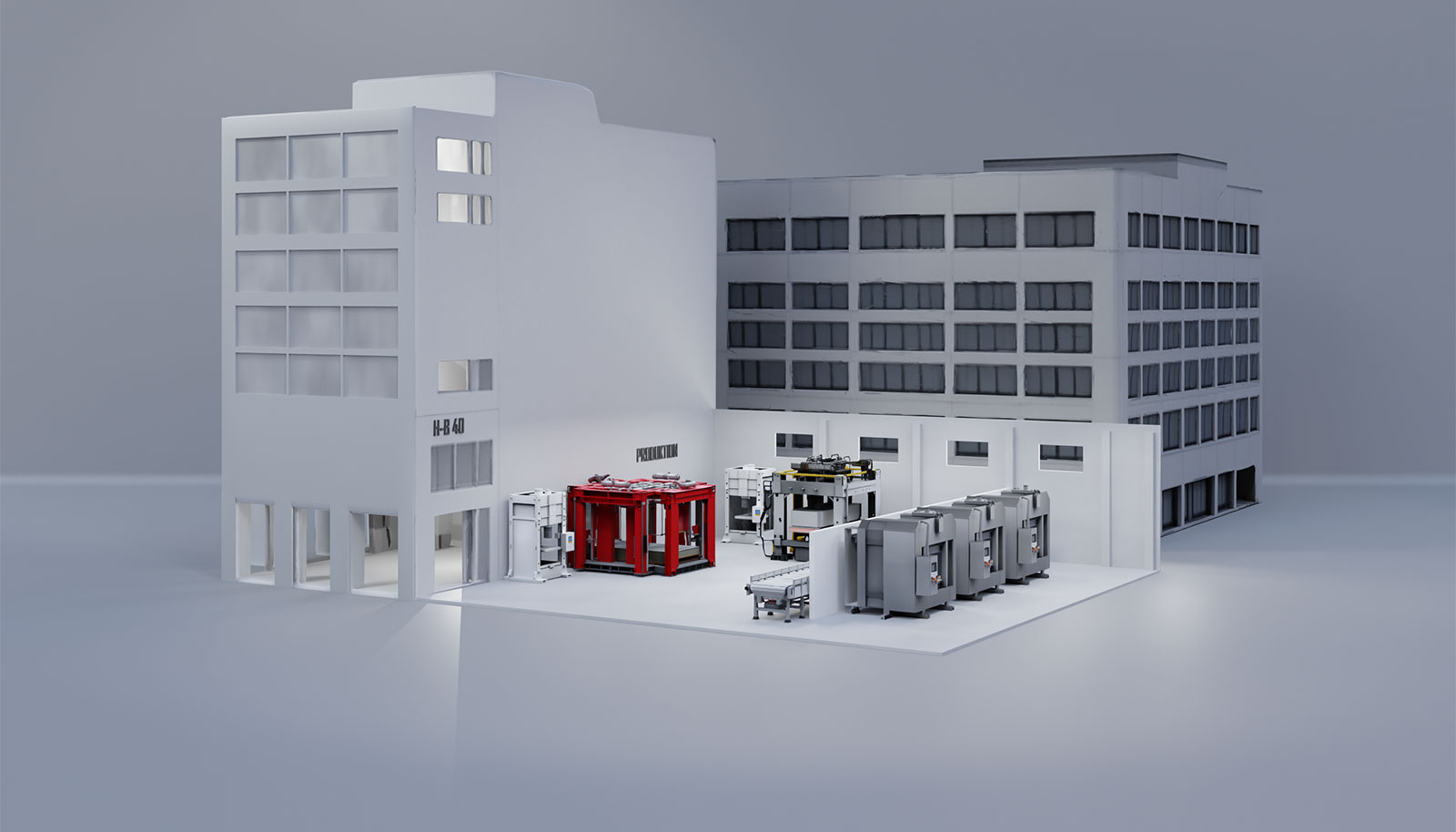 Modell eines Fabrikgebäudes mit Produktionsbereich und mehreren Maschinen als Symbol für moderne Fertigung.